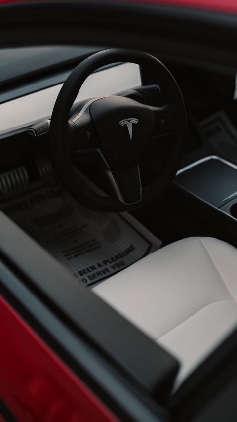 Download wallpaper 2160x3840 tesla, car, salon, steering wheel, seats samsung galaxy s4, s5, note, sony xperia z, z1, z2, z3, htc one, lenovo vibe hd background