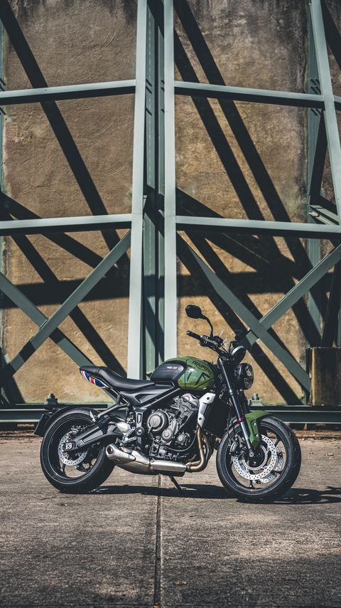 Download wallpaper 2160x3840 triumph, motorcycle, bike, green samsung galaxy s4, s5, note, sony xperia z, z1, z2, z3, htc one, lenovo vibe hd background