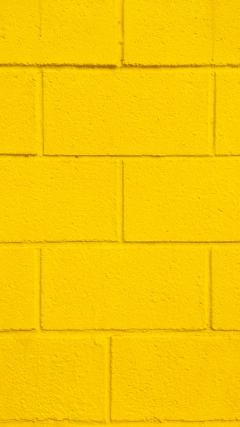 Download wallpaper 2160x3840 wall, bricks, surface, rough, yellow samsung galaxy s4, s5, note, sony xperia z, z1, z2, z3, htc one, lenovo vibe hd background