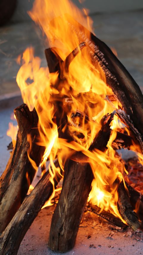 Download wallpaper 2160x3840 bonfire, logs, flame, fire samsung galaxy s4, s5, note, sony xperia z, z1, z2, z3, htc one, lenovo vibe hd background