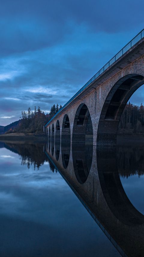 Download wallpaper 2160x3840 bridge, construction, water, reflection, twilight samsung galaxy s4, s5, note, sony xperia z, z1, z2, z3, htc one, lenovo vibe hd background