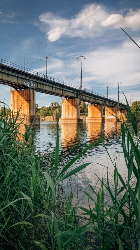 Download wallpaper 2160x3840 bridge, river, water, reeds samsung galaxy s4, s5, note, sony xperia z, z1, z2, z3, htc one, lenovo vibe hd background