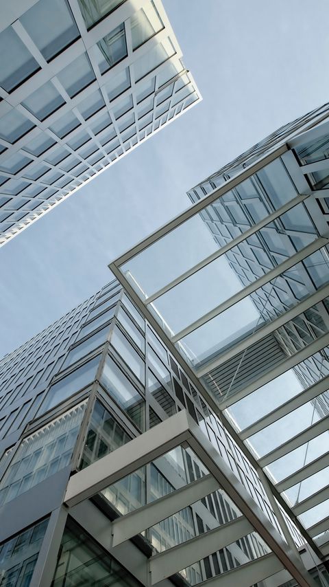 Download wallpaper 2160x3840 building, glass, windows, architecture, construction, bottom view samsung galaxy s4, s5, note, sony xperia z, z1, z2, z3, htc one, lenovo vibe hd background