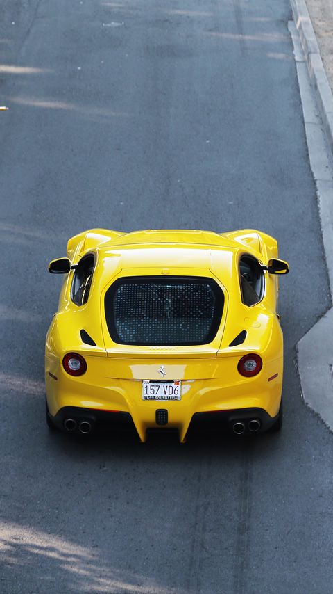 Download wallpaper 2160x3840 ferrari, car, sports car, yellow, aerial view samsung galaxy s4, s5, note, sony xperia z, z1, z2, z3, htc one, lenovo vibe hd background