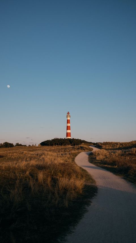 Download wallpaper 2160x3840 lighthouse, tower, road, grass, landscape samsung galaxy s4, s5, note, sony xperia z, z1, z2, z3, htc one, lenovo vibe hd background