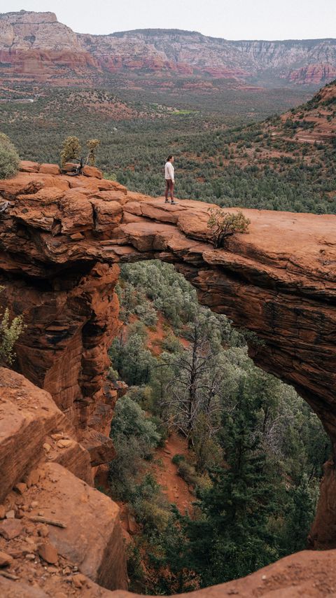 Download wallpaper 2160x3840 man, alone, canyon, rocks, view samsung galaxy s4, s5, note, sony xperia z, z1, z2, z3, htc one, lenovo vibe hd background