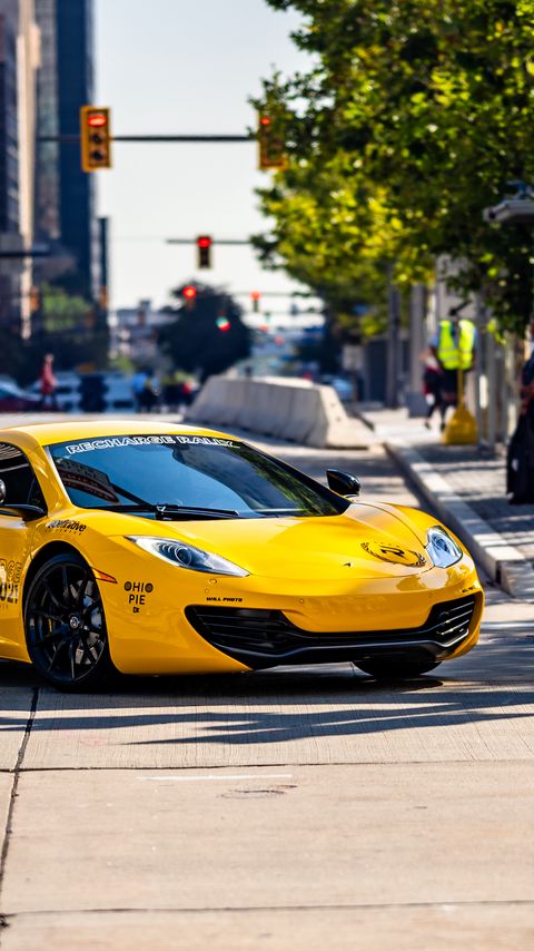 Download wallpaper 2160x3840 mclaren, car, sports car, yellow, parking samsung galaxy s4, s5, note, sony xperia z, z1, z2, z3, htc one, lenovo vibe hd background