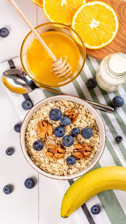 Download wallpaper 2160x3840 muesli, berries, honey, breakfast, bowl samsung galaxy s4, s5, note, sony xperia z, z1, z2, z3, htc one, lenovo vibe hd background