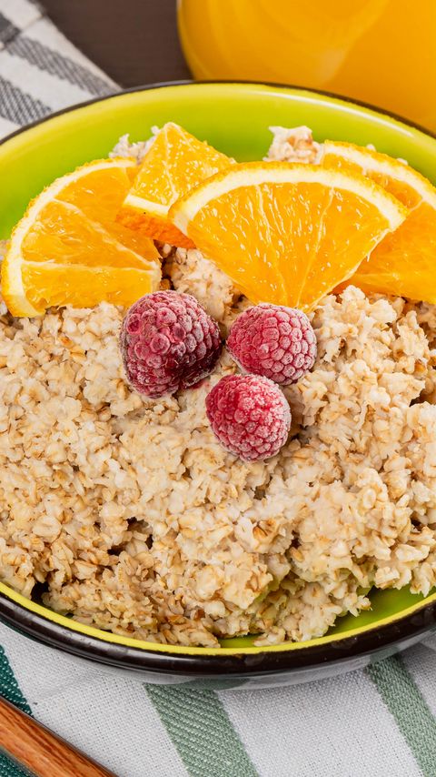 Download wallpaper 2160x3840 oatmeal, porridge, berries, fruit, bowl, breakfast samsung galaxy s4, s5, note, sony xperia z, z1, z2, z3, htc one, lenovo vibe hd background