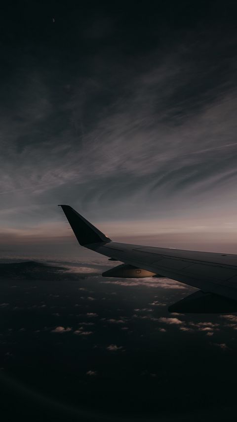 Download wallpaper 2160x3840 plane, wing, clouds, sky, twilight samsung galaxy s4, s5, note, sony xperia z, z1, z2, z3, htc one, lenovo vibe hd background