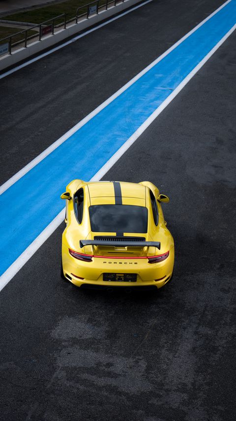 Download wallpaper 2160x3840 porsche 911, porsche, car, yellow, track samsung galaxy s4, s5, note, sony xperia z, z1, z2, z3, htc one, lenovo vibe hd background