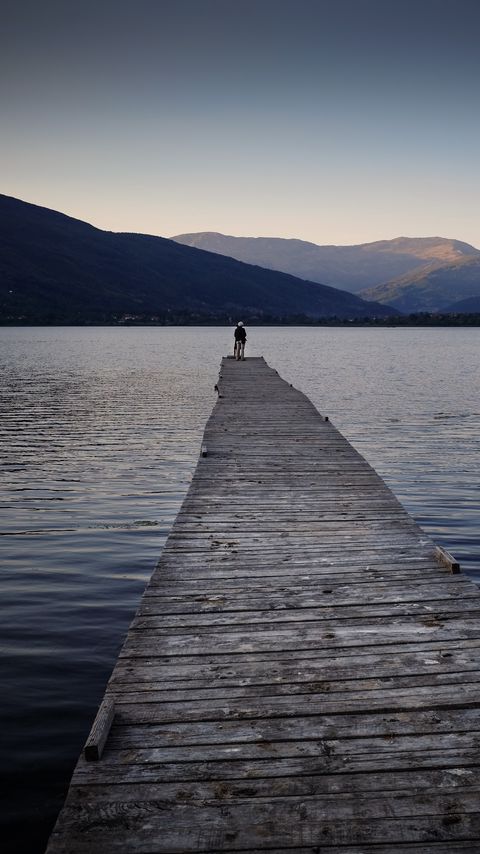 Download wallpaper 2160x3840 silhouettes, pier, lake, water, mountains, nature samsung galaxy s4, s5, note, sony xperia z, z1, z2, z3, htc one, lenovo vibe hd background