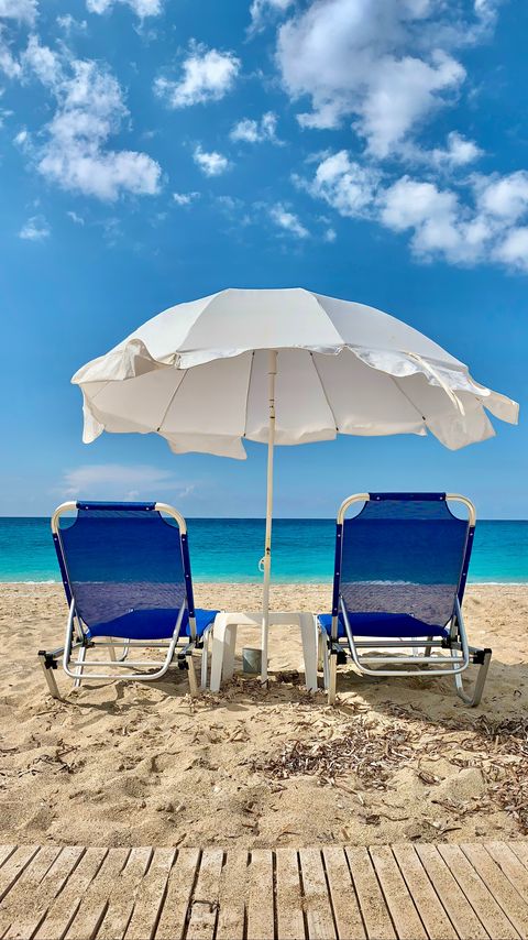 Download wallpaper 2160x3840 sun loungers, umbrella, beach, sea, summer samsung galaxy s4, s5, note, sony xperia z, z1, z2, z3, htc one, lenovo vibe hd background