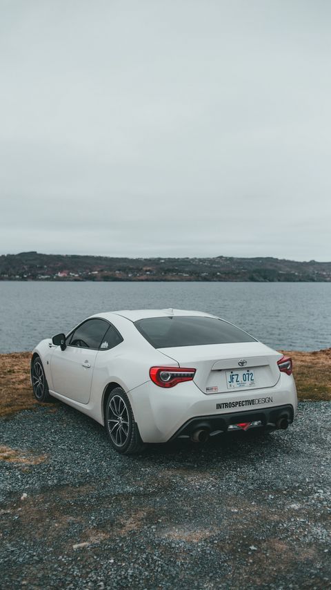 Download wallpaper 2160x3840 toyota, car, white, coast samsung galaxy s4, s5, note, sony xperia z, z1, z2, z3, htc one, lenovo vibe hd background