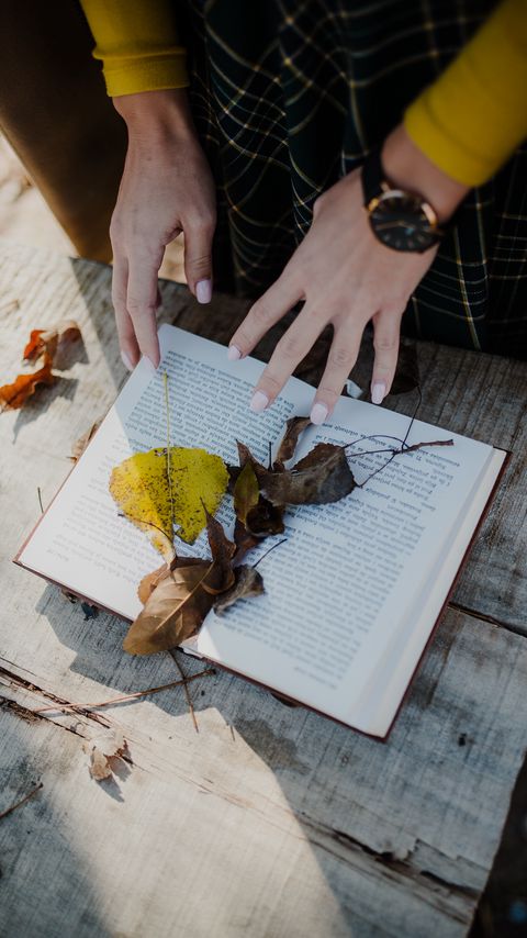 Download wallpaper 2160x3840 book, leaves, hands, autumn, aesthetics samsung galaxy s4, s5, note, sony xperia z, z1, z2, z3, htc one, lenovo vibe hd background