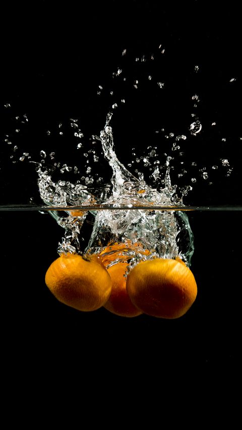 Download wallpaper 2160x3840 tangerines, fruits, water, underwater, spray samsung galaxy s4, s5, note, sony xperia z, z1, z2, z3, htc one, lenovo vibe hd background