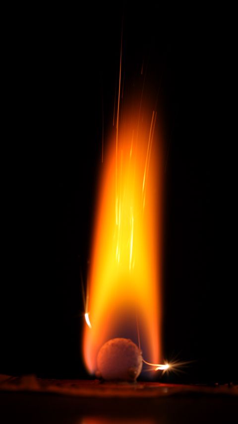 Download wallpaper 2160x3840 ball, flame, fire, dark, sparks samsung galaxy s4, s5, note, sony xperia z, z1, z2, z3, htc one, lenovo vibe hd background