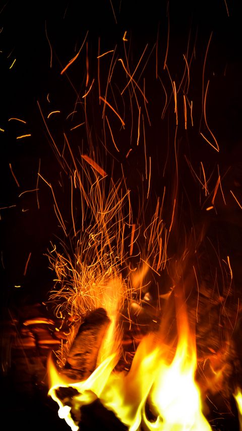 Download wallpaper 2160x3840 bonfire, flame, sparks, darkness samsung galaxy s4, s5, note, sony xperia z, z1, z2, z3, htc one, lenovo vibe hd background