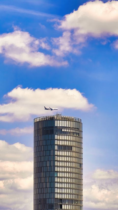 Download wallpaper 2160x3840 building, architecture, airplane, sky samsung galaxy s4, s5, note, sony xperia z, z1, z2, z3, htc one, lenovo vibe hd background