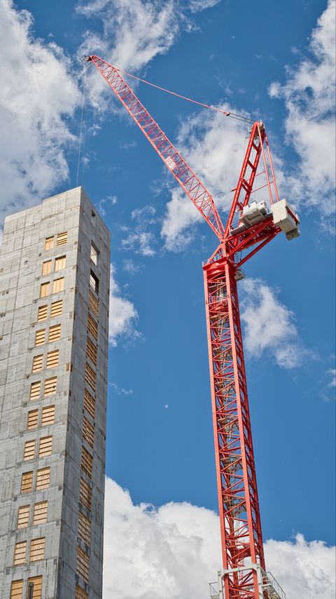 Download wallpaper 2160x3840 building, crane, construction samsung galaxy s4, s5, note, sony xperia z, z1, z2, z3, htc one, lenovo vibe hd background