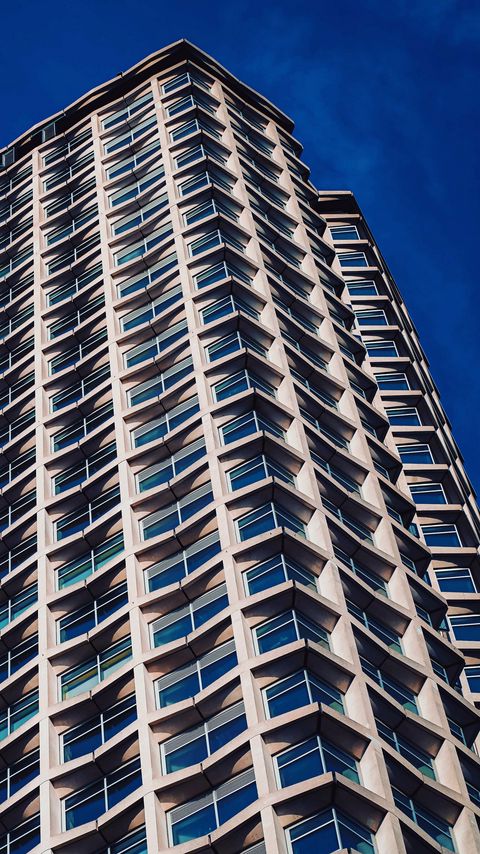 Download wallpaper 2160x3840 building, facade, windows, sky, blue samsung galaxy s4, s5, note, sony xperia z, z1, z2, z3, htc one, lenovo vibe hd background