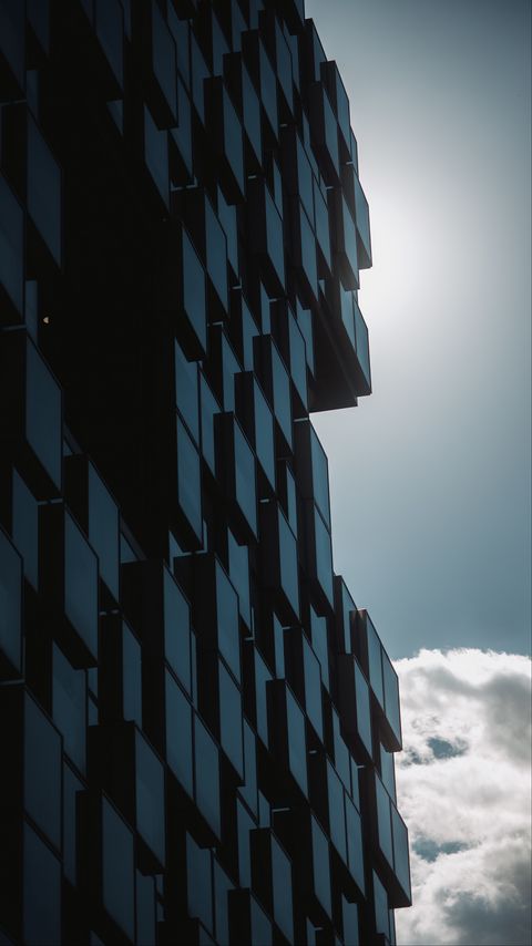 Download wallpaper 2160x3840 building, relief, facade, clouds samsung galaxy s4, s5, note, sony xperia z, z1, z2, z3, htc one, lenovo vibe hd background