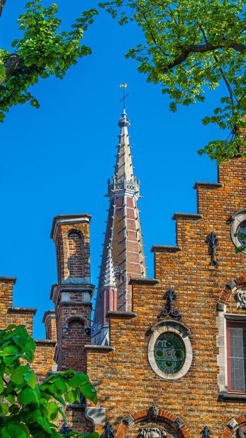 Download wallpaper 2160x3840 building, tower, bricks, stained glass, architecture samsung galaxy s4, s5, note, sony xperia z, z1, z2, z3, htc one, lenovo vibe hd background