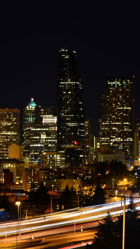 Download wallpaper 2160x3840 buildings, lights, road, glow, city, night samsung galaxy s4, s5, note, sony xperia z, z1, z2, z3, htc one, lenovo vibe hd background