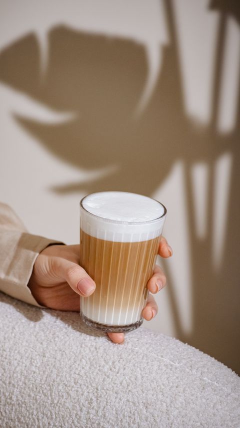 Download wallpaper 2160x3840 coffee, latte, glass, hand samsung galaxy s4, s5, note, sony xperia z, z1, z2, z3, htc one, lenovo vibe hd background