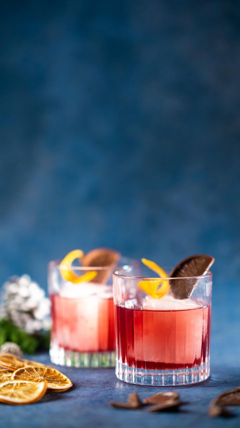 Download wallpaper 2160x3840 glasses, drinks, orange, slices samsung galaxy s4, s5, note, sony xperia z, z1, z2, z3, htc one, lenovo vibe hd background