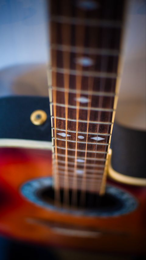 Download wallpaper 2160x3840 guitar, strings, fretboard, blur, music samsung galaxy s4, s5, note, sony xperia z, z1, z2, z3, htc one, lenovo vibe hd background