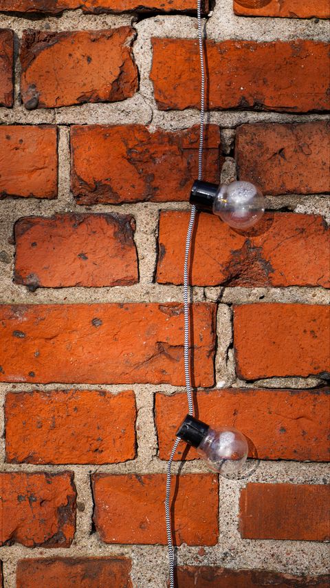 Download wallpaper 2160x3840 light bulbs, wire, bricks, wall samsung galaxy s4, s5, note, sony xperia z, z1, z2, z3, htc one, lenovo vibe hd background