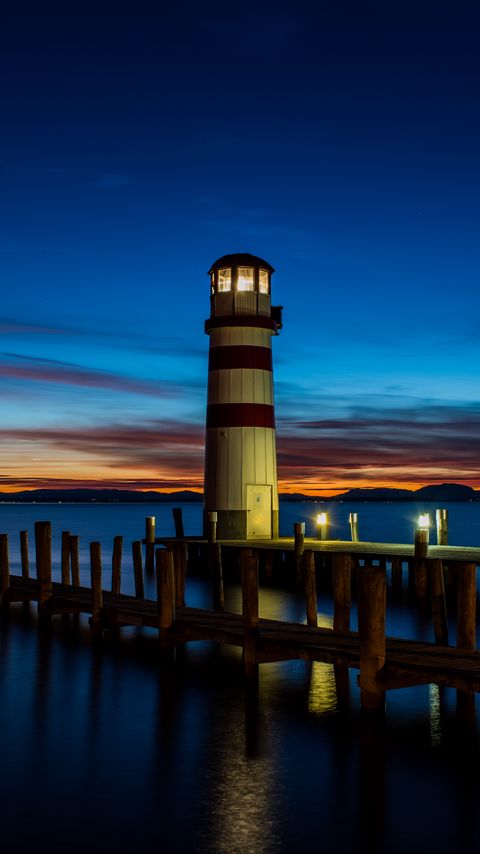 Download wallpaper 2160x3840 lighthouse, pier, sea, lights, twilight samsung galaxy s4, s5, note, sony xperia z, z1, z2, z3, htc one, lenovo vibe hd background