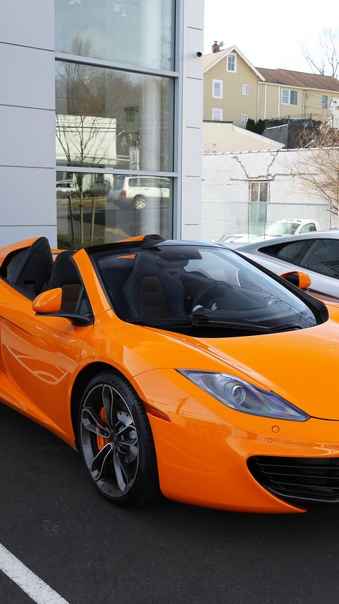 Download wallpaper 2160x3840 mclaren 12c, mclaren, car, orange, sports car samsung galaxy s4, s5, note, sony xperia z, z1, z2, z3, htc one, lenovo vibe hd background
