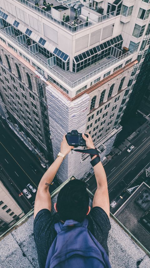 Download wallpaper 2160x3840 photographer, camera, buildings, height samsung galaxy s4, s5, note, sony xperia z, z1, z2, z3, htc one, lenovo vibe hd background