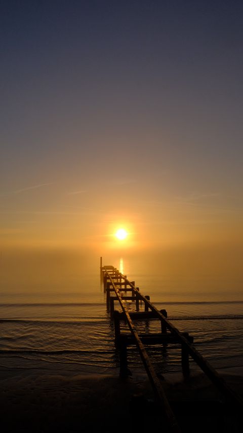 Download wallpaper 2160x3840 pier, sea, sunset, dark samsung galaxy s4, s5, note, sony xperia z, z1, z2, z3, htc one, lenovo vibe hd background