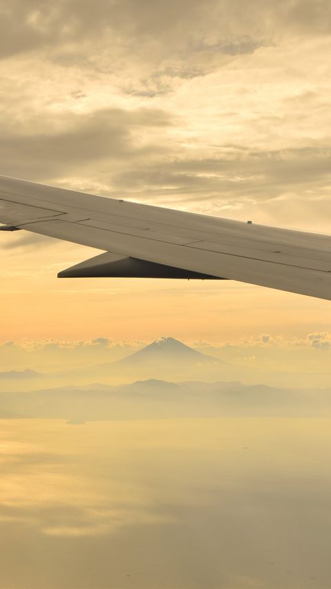 Download wallpaper 2160x3840 plane, wing, clouds, height samsung galaxy s4, s5, note, sony xperia z, z1, z2, z3, htc one, lenovo vibe hd background