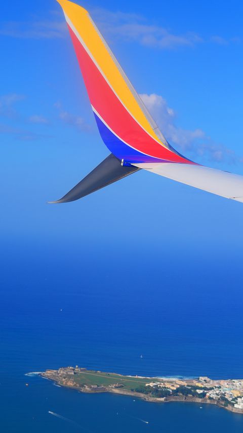 Download wallpaper 2160x3840 plane, wing, island, sea, sky, height samsung galaxy s4, s5, note, sony xperia z, z1, z2, z3, htc one, lenovo vibe hd background
