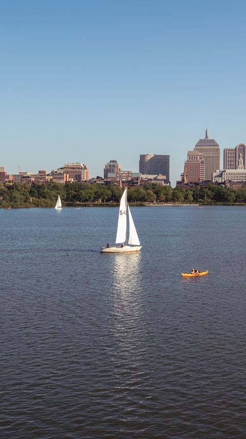 Download wallpaper 2160x3840 river, sail, boat, trees, buildings, city samsung galaxy s4, s5, note, sony xperia z, z1, z2, z3, htc one, lenovo vibe hd background