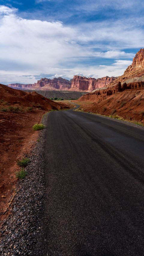 Download wallpaper 2160x3840 road, rocks, canyon, nature samsung galaxy s4, s5, note, sony xperia z, z1, z2, z3, htc one, lenovo vibe hd background