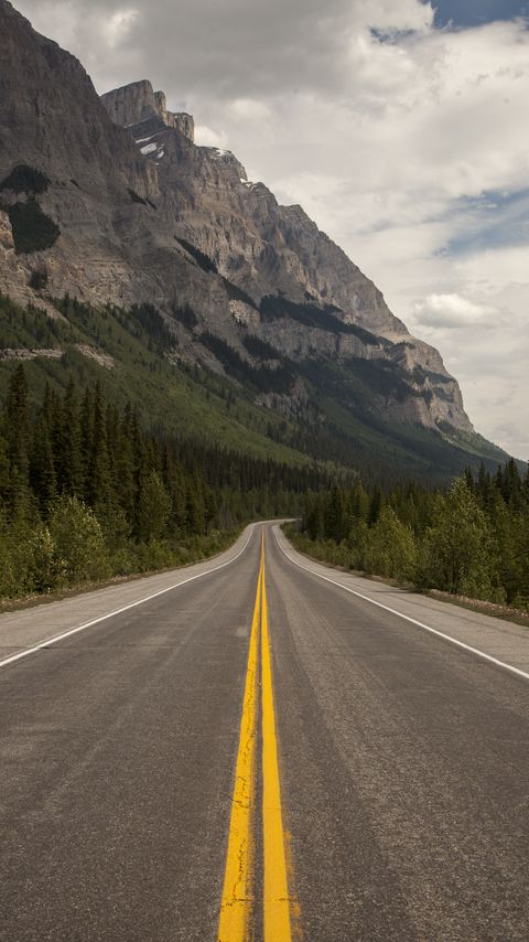 Download wallpaper 2160x3840 road, trees, rock, slope samsung galaxy s4, s5, note, sony xperia z, z1, z2, z3, htc one, lenovo vibe hd background