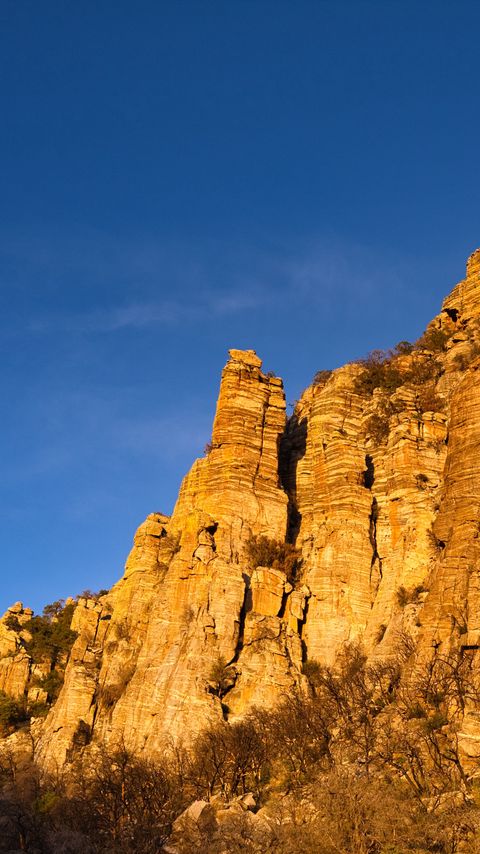 Download wallpaper 2160x3840 rock, relief, bushes, sky samsung galaxy s4, s5, note, sony xperia z, z1, z2, z3, htc one, lenovo vibe hd background
