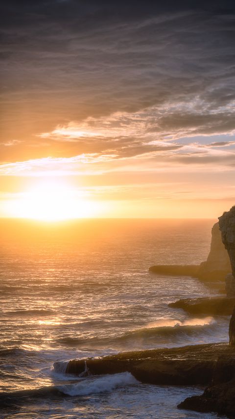 Download wallpaper 2160x3840 sea, waves, rocks, sunset samsung galaxy s4, s5, note, sony xperia z, z1, z2, z3, htc one, lenovo vibe hd background