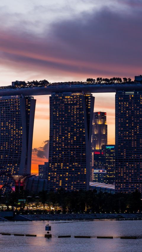 Download wallpaper 2160x3840 skyscrapers, lights, river, twilight, city samsung galaxy s4, s5, note, sony xperia z, z1, z2, z3, htc one, lenovo vibe hd background