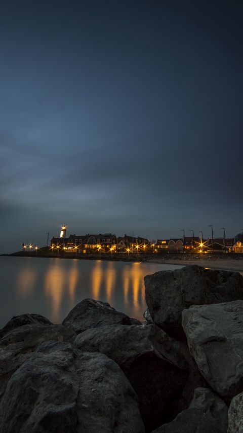 Download wallpaper 2160x3840 stones, sea, lighthouse, houses, lights samsung galaxy s4, s5, note, sony xperia z, z1, z2, z3, htc one, lenovo vibe hd background