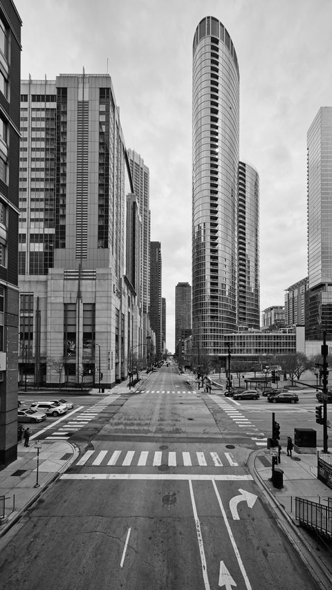 Download wallpaper 2160x3840 street, road, buildings, city, black and white samsung galaxy s4, s5, note, sony xperia z, z1, z2, z3, htc one, lenovo vibe hd background