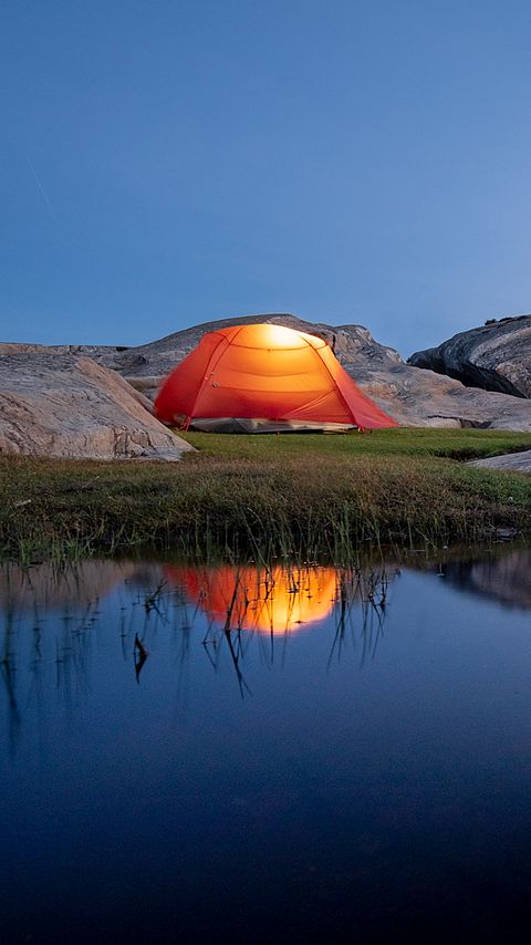 Download wallpaper 2160x3840 tent, camping, stones, pond, reflection, nature samsung galaxy s4, s5, note, sony xperia z, z1, z2, z3, htc one, lenovo vibe hd background